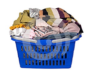 Basket full of various clothes, isolated on white background