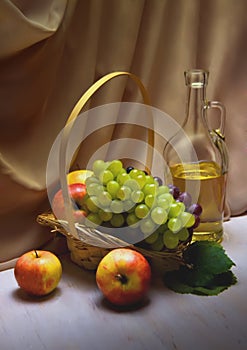 Basket with grapes and apples next to a bottle of wine