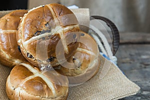 Basket with hot cross Easter buns