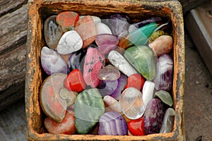 Basket with a lot of natural stones