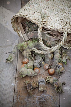 Basket with nuts on the table