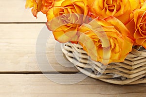 Basket of orange roses