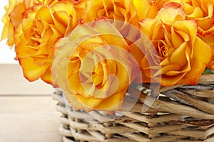 Basket of orange roses