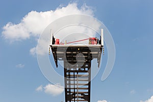Basket over the special long ladder of a fire truck