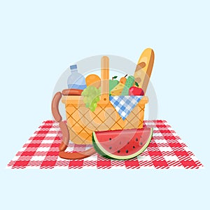 Basket for a picnic with fruit and various food.