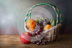 Basket with pile of fruits, Still Life