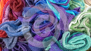 Basket with rainbow fabrics. Colored fabrics. Homemakers& x27; Market photo