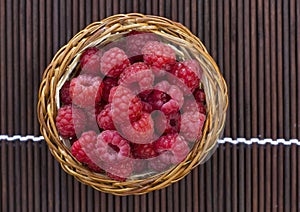 Basket with raspberry