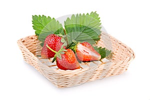 Basket of red strawberry fruits