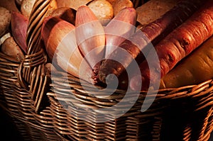 Basket of root vegetables and mushrooms