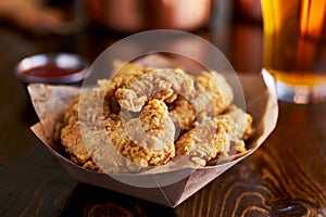 Basket of tasty fried chicken tenders