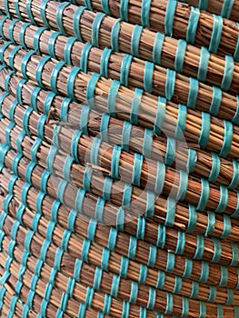 Basket texture, straw and turquoise rubber band