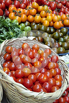 Basket of Tomatos on a market stall