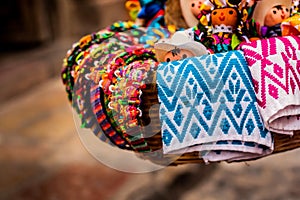 Basket of traditional dolls and mexican crafts