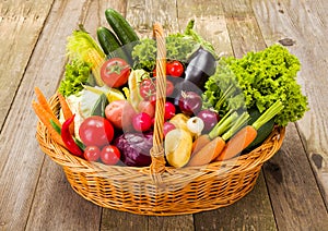 Basket with various fresh vegetables