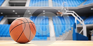 Basketball ball on basketball court in an empty basketball arena