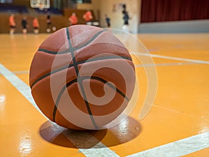 Basketball ball on court with free throw line