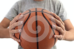 Basketball ball in hands. photo