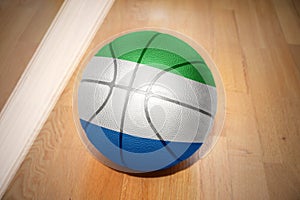 Basketball ball with the national flag of sierra leone photo