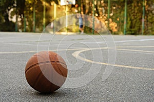 Basketball ball on the outdoor sports ground. Sports concept