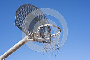 Basketball basket with backboard and metal net photo