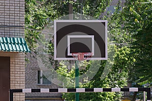 Basketball basket in schools yard front view