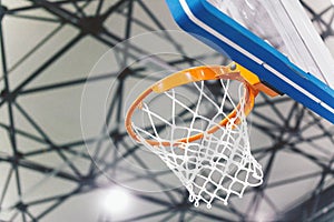 Basketball basket at a sports arena. Scoring the winning points at a basketball game