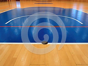 Basketball circle inside of sport hall.