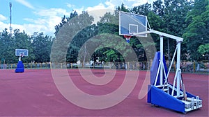 The basketball court is arranged on the rubberized surface of the stadium. Basketball shields with rings and baskets are fixed on