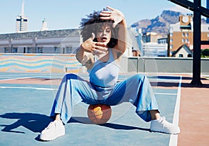 Basketball court, fashion and frame of hands of black woman urban style, feminist and armpit hair in city. Sports