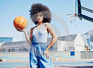 Basketball court, fashion and portrait of black woman in city with attitude, urban style and trendy clothes. Sports