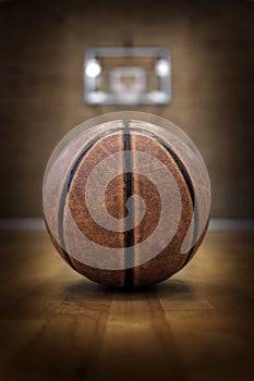 Basketball on Court with Hoops Rim Hardwood Floor Lights