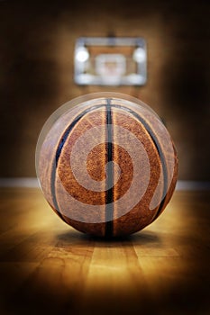 Basketball on Court with Hoops Rim Hardwood Floor Lights