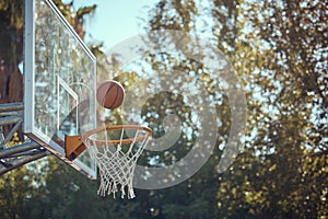 Basketball court net, point score and sports playing game, competition and action match outdoor. Background hoop winning