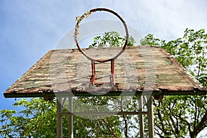 Basketball court  with old wood backboard.blue sky and white clouds on background. Old Basin Stadium,on white background,with