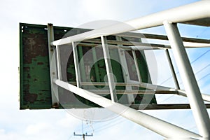 Basketball court  with old wood backboard.blue sky and white clouds on background. Old Basin Stadium,on white background