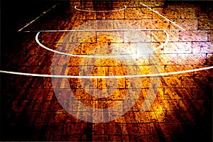 Basketball court with red brick wall
