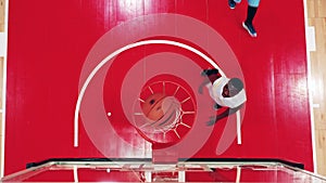 Basketball game of african-american opponents shot from above