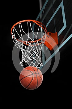 Basketball Going Through Hoop photo