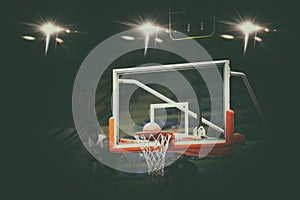 Basketball going through net and scoring during match ,Blurry an