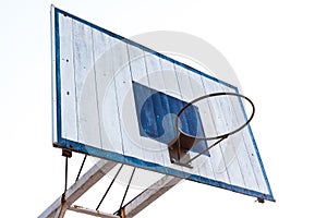 Basketball hoop on blue wood and white iron structure base
