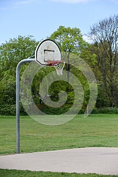 Basketball hoop with net on an outdoor basketball court