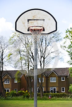 Basketball hoop with net on an outdoor basketball court