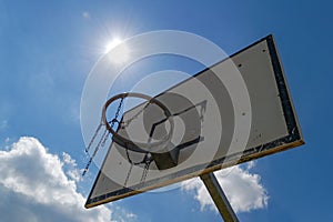 Basketball hoop in the sun