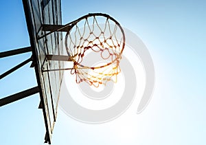 Basketball hoop in sunlight / for goal concept