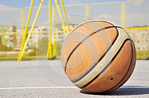 Basketball iluminating by sunlight