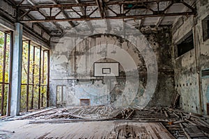 Basketball indoors court in the abandoned school building located in the Chernobyl ghost town