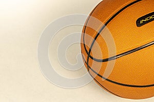 A basketball on a light background. Close-up. Selective focus