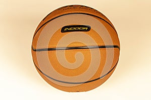 A basketball on a light background. Close-up. Selective focus