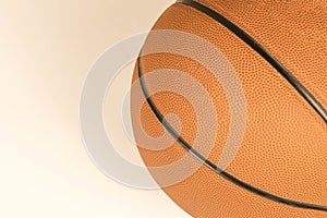 A basketball on a light background. Close-up. Selective focus